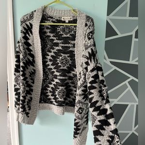 small gray and black cardigan